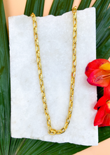 Load image into Gallery viewer, Catena necklace in gold on marble slab with leaves and flowers