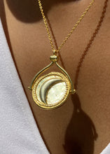 Load image into Gallery viewer, Rotating sun and moon pendant facing moon side