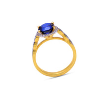 Load image into Gallery viewer, Blue sapphire halo ring in gold
