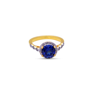 Blue sapphire halo ring by erus the label