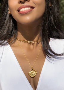 Model wearing Rotating sun and moon pendant