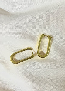 Sleek Oblong earrings on white cloth