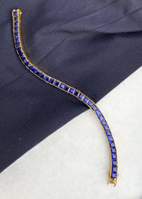 Load image into Gallery viewer, sapphire square cut tennis bracelet on marble table
