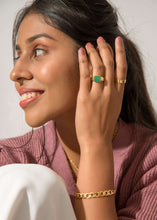Load image into Gallery viewer, Model wearing rings and cuban bracelet wearing pink sweater
