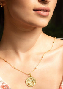 Model wearing Modern Maharani Necklace in ball chain.